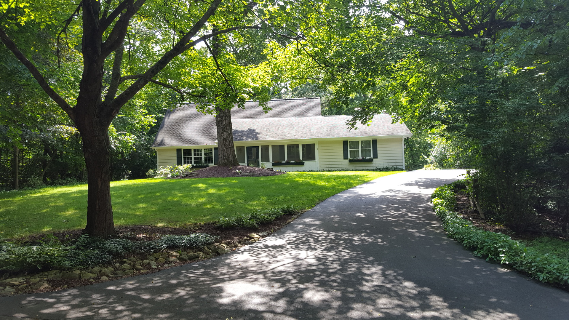 172 Stonegate Road Trout Valley, IL 60013 - Photo 1 of 20 a front view of a house with a yard