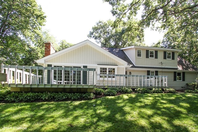 172 Stonegate Road Trout Valley, IL 60013 - Photo 2 of 20 a front view of a house with a yard and porch