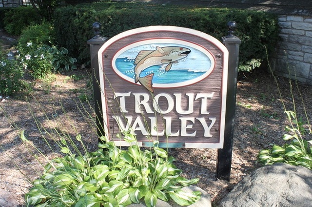 172 Stonegate Road Trout Valley, IL 60013 - Photo 17 of 20 a sign that is on the side of the road