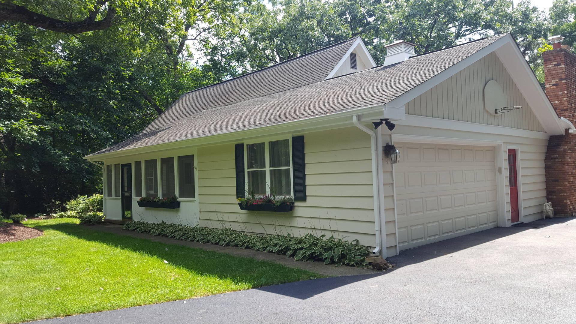172 Stonegate Road Trout Valley, IL 60013 - Photo 3 of 20 a view of a house with a yard potted plants and a large tree