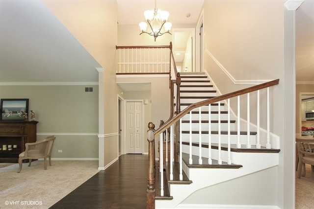 172 Stonegate Road Trout Valley, IL 60013 - Photo 4 of 20 a view of entryway and hall with wooden floor