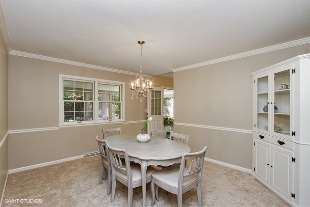 172 Stonegate Road Trout Valley, IL 60013 - Photo 8 of 20 a view of a dining room with furniture window and outside view