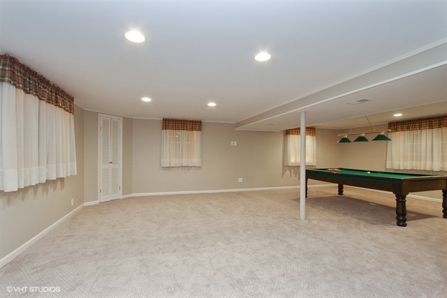 172 Stonegate Road Trout Valley, IL 60013 - Photo 10 of 20 a view of an empty room with wooden floor