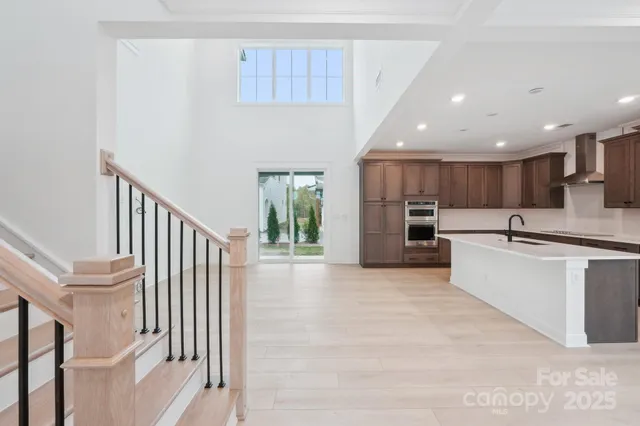 a view of kitchen with cabinets and stainless steel appliances