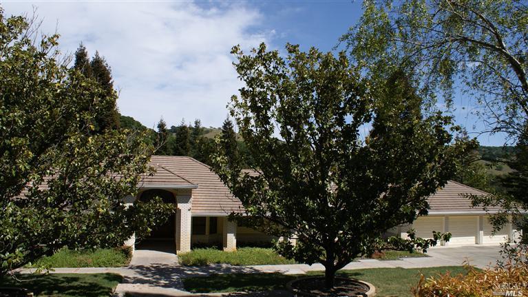 Undisclosed Address Fairfield, CA 94534 - Photo 1 of 1 a front view of a house with garden