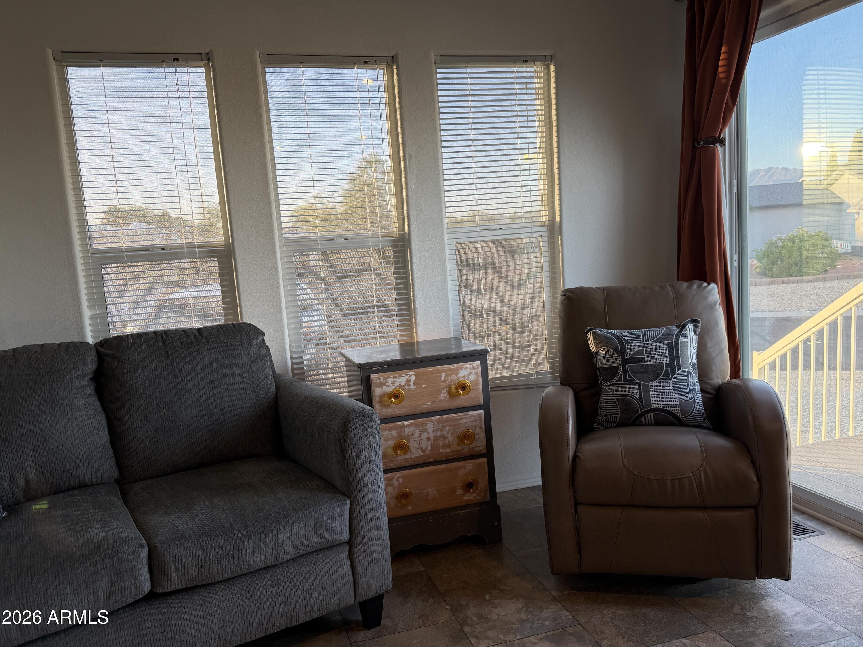 21245 Westward View Road, Unit 248 Congress, AZ 85332 - Photo 11 of 28 a living room with furniture and a window