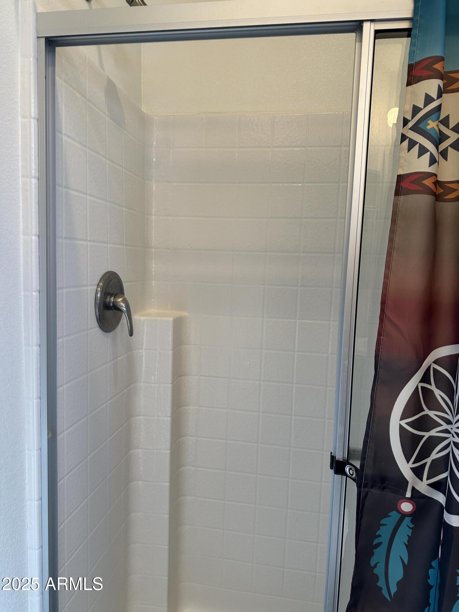 21245 Westward View Road, Unit 248 Congress, AZ 85332 - Photo 18 of 28 a bathroom with a shower