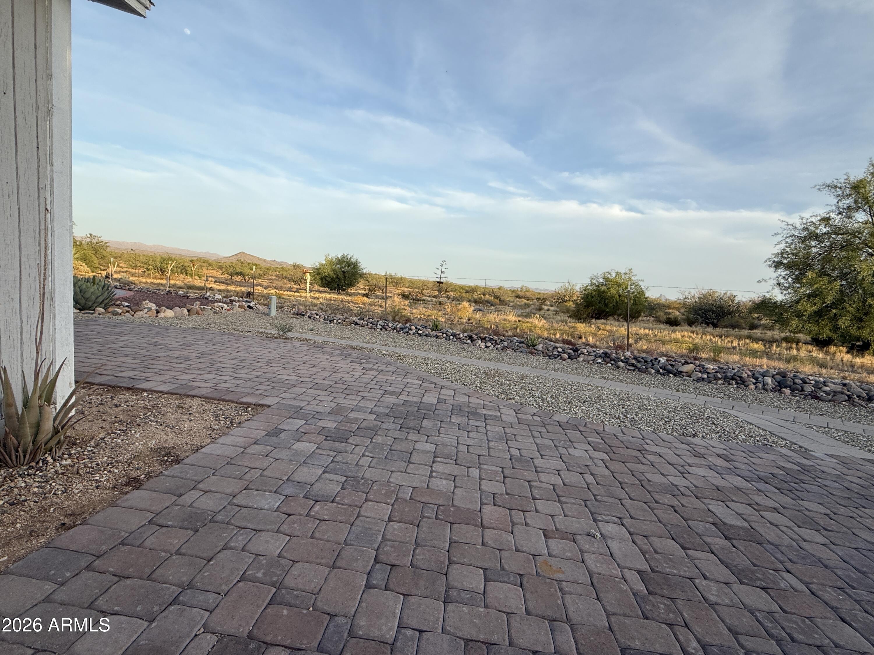 21245 Westward View Road, Unit 248 Congress, AZ 85332 - Photo 2 of 28 a view of an outdoor space with mountain view