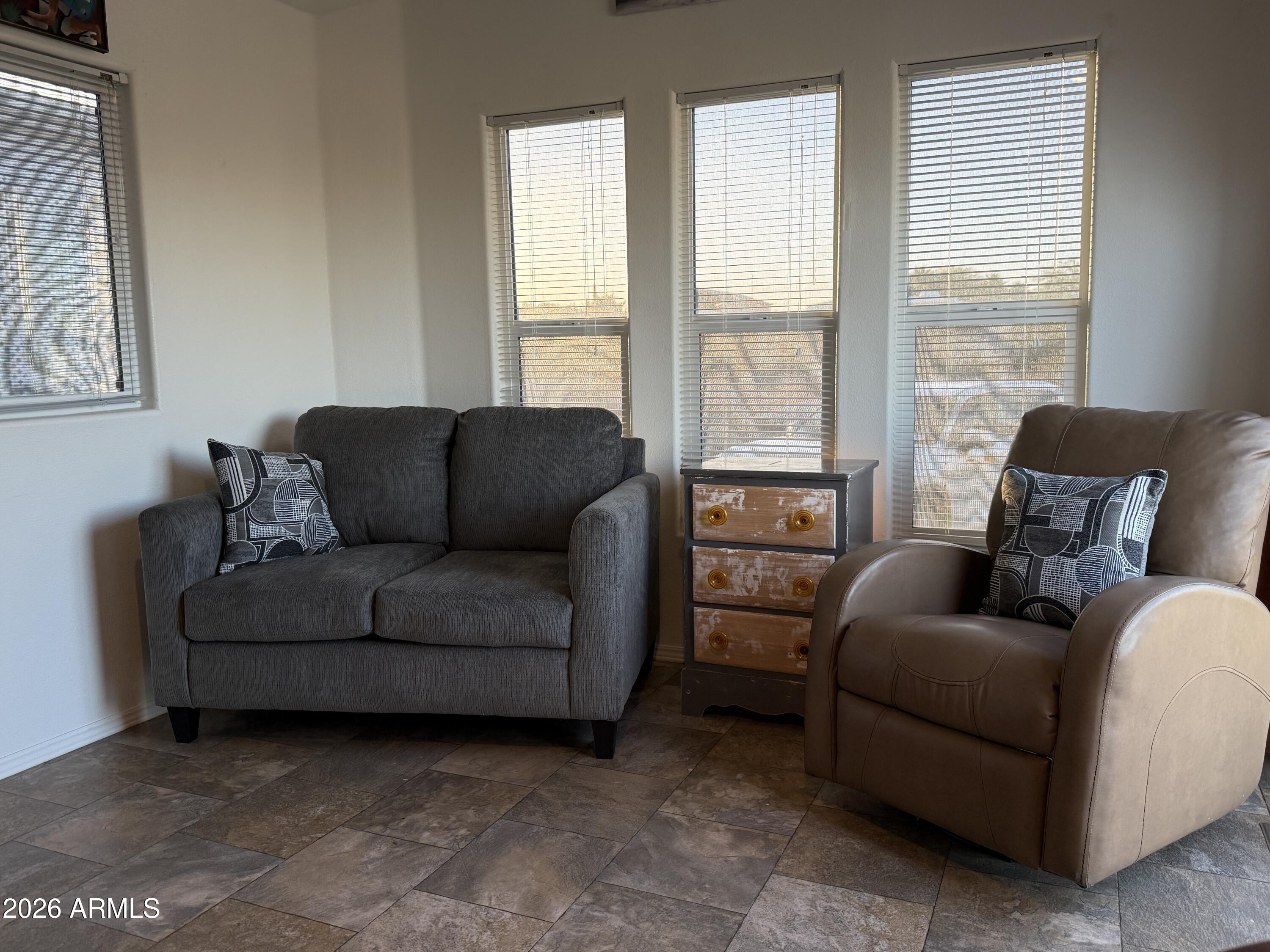 21245 Westward View Road, Unit 248 Congress, AZ 85332 - Photo 5 of 28 a living room with furniture and a window