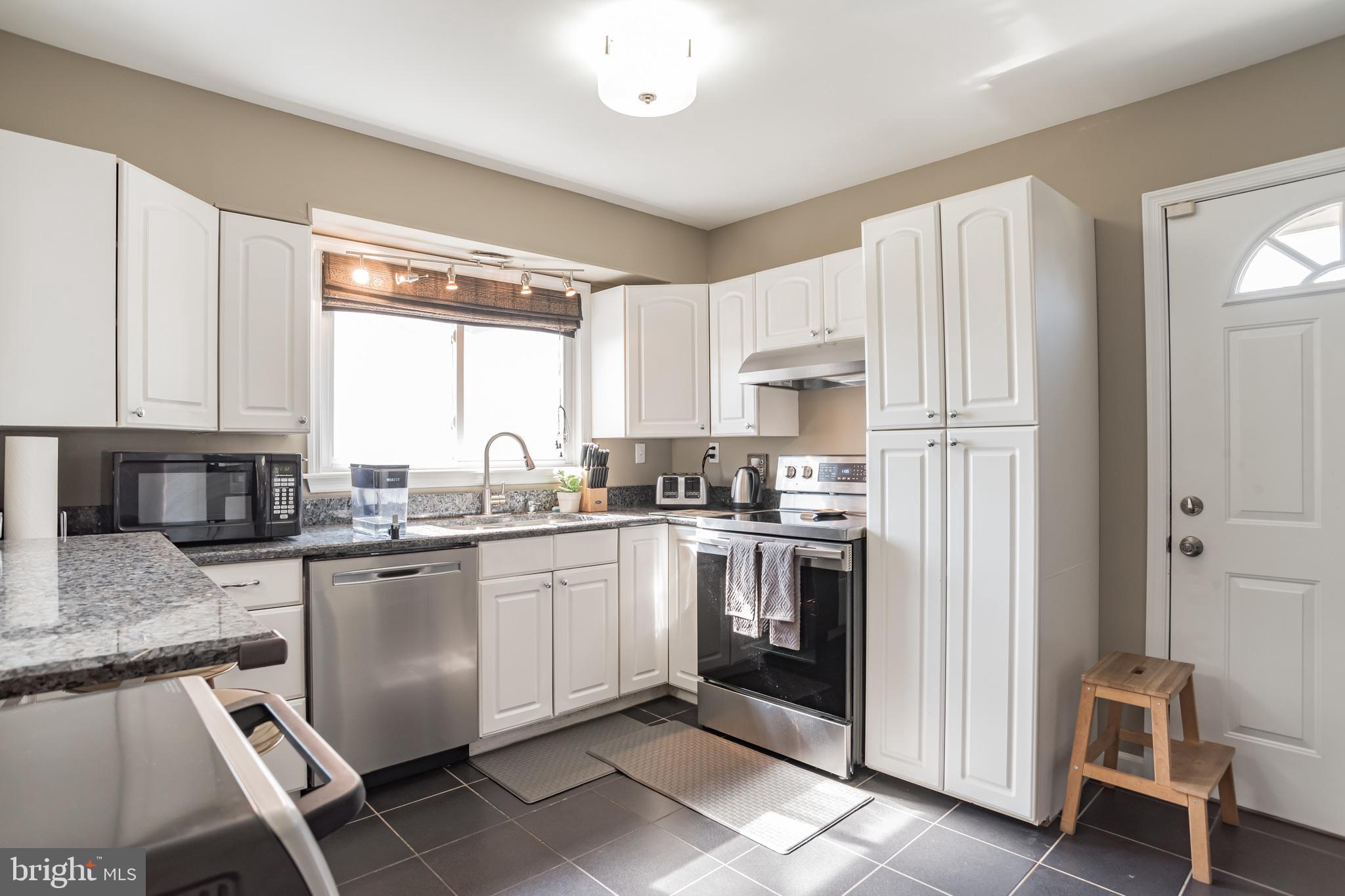 911 Sedgley Road Baltimore, MD 21228 - Photo 12 of 27 Updated Kitchen - Stainless Steel Appliances