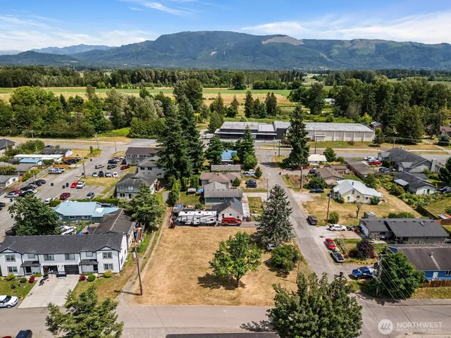 an aerial view of residential house with outdoor space