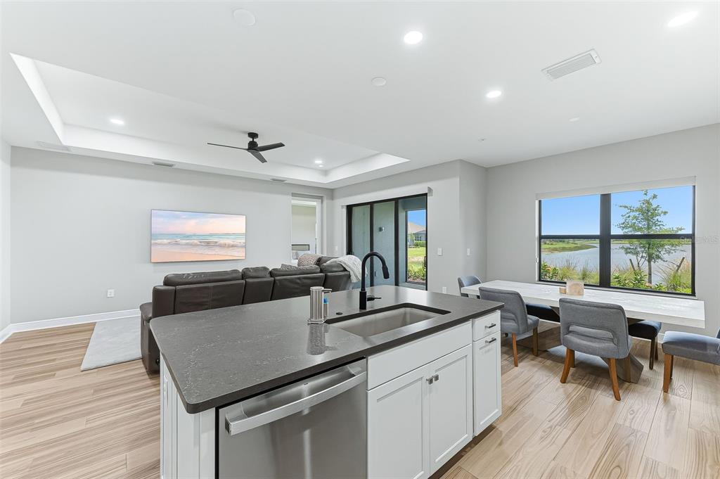4191 Pegasus Way Naples, FL 34120 - Photo 12 of 48 a living room with furniture and a large window
