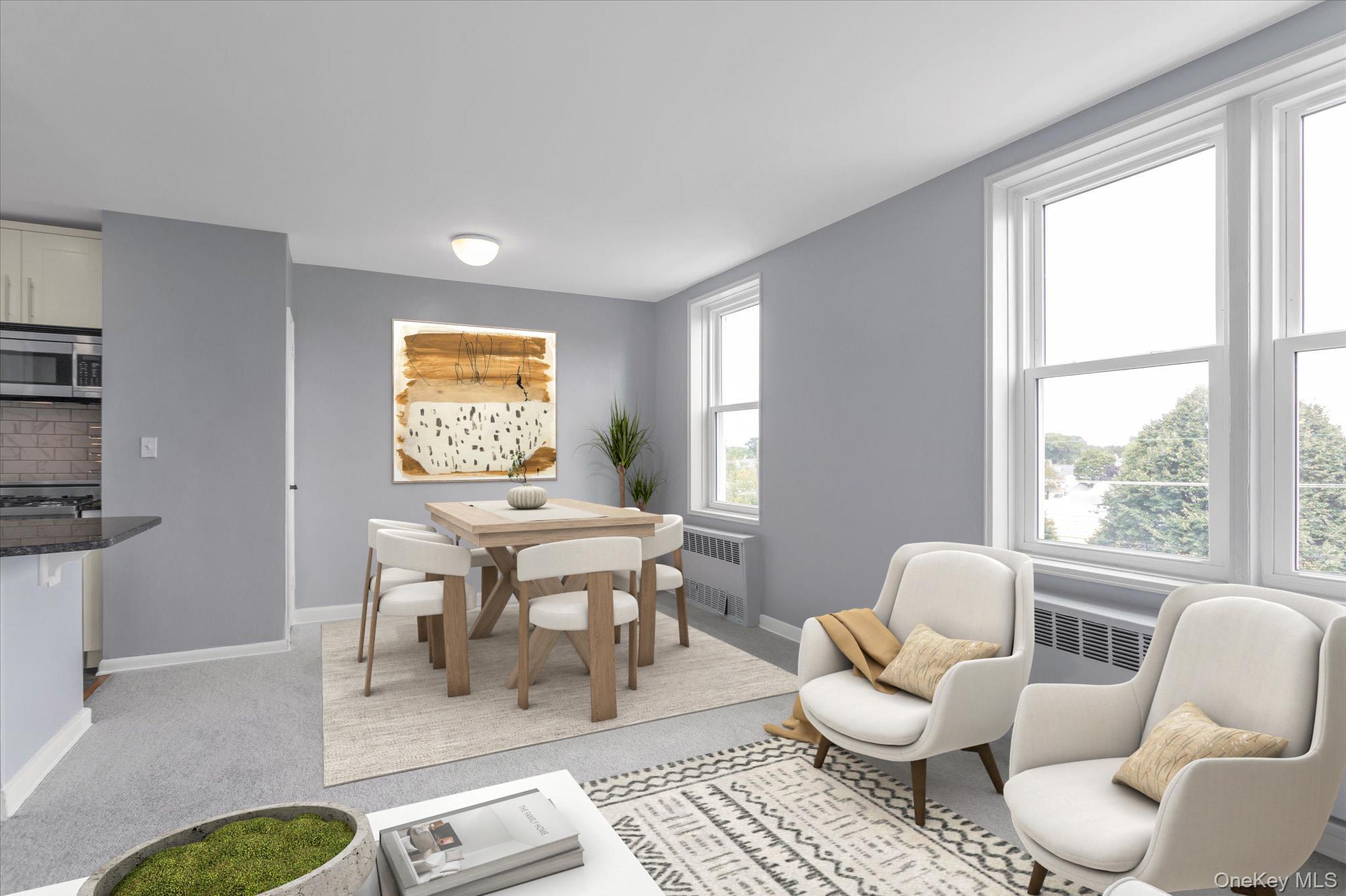 504 Merrick Road, Unit 4J Lynbrook, NY 11563 - Photo 14 of 28 a living room with furniture a table and a large window