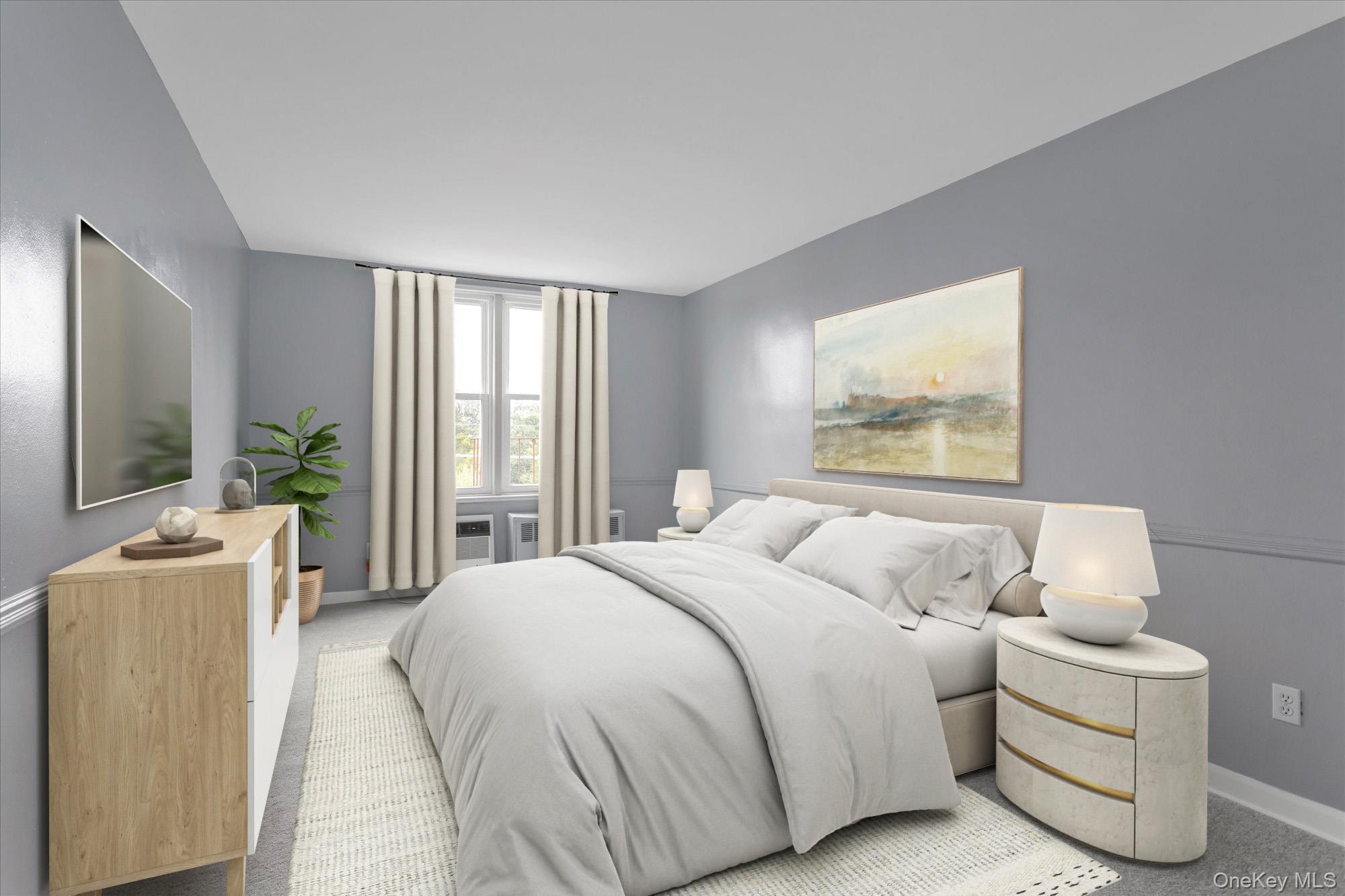 504 Merrick Road, Unit 4J Lynbrook, NY 11563 - Photo 17 of 28 a bedroom with a bed and a large window