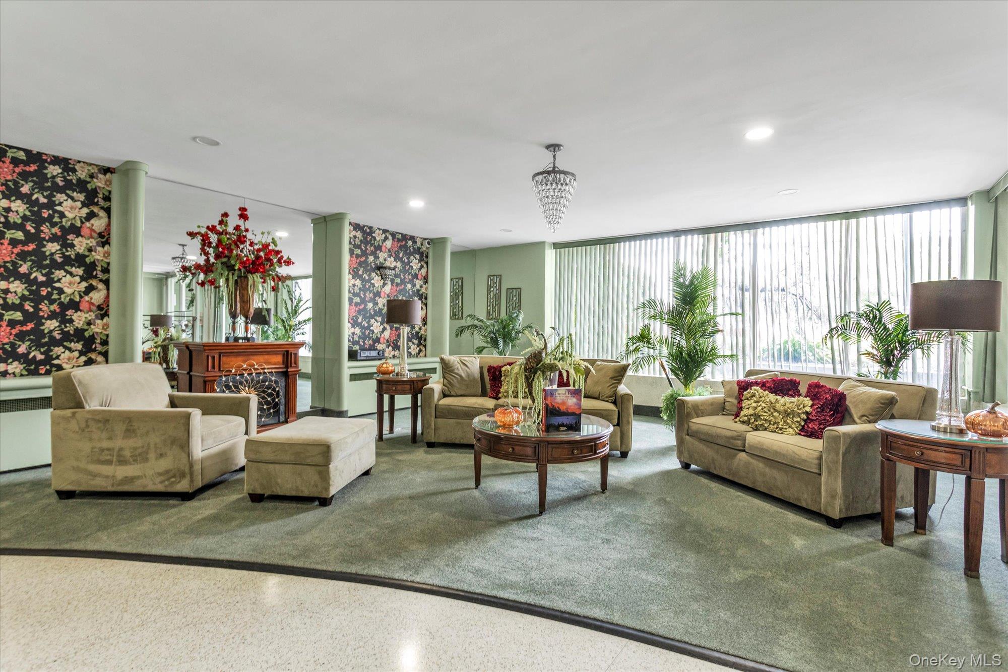 504 Merrick Road, Unit 4J Lynbrook, NY 11563 - Photo 18 of 28 a living room with furniture and a large window