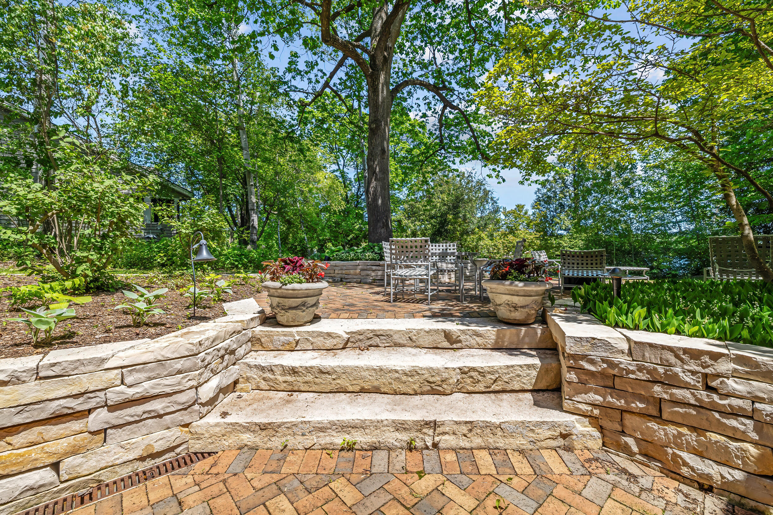 N7951 Lakeside Park Road Rhine, WI 53020 - Photo 51 of 74 Lannon stone lower patio