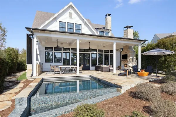 a view of house with outdoor seating space