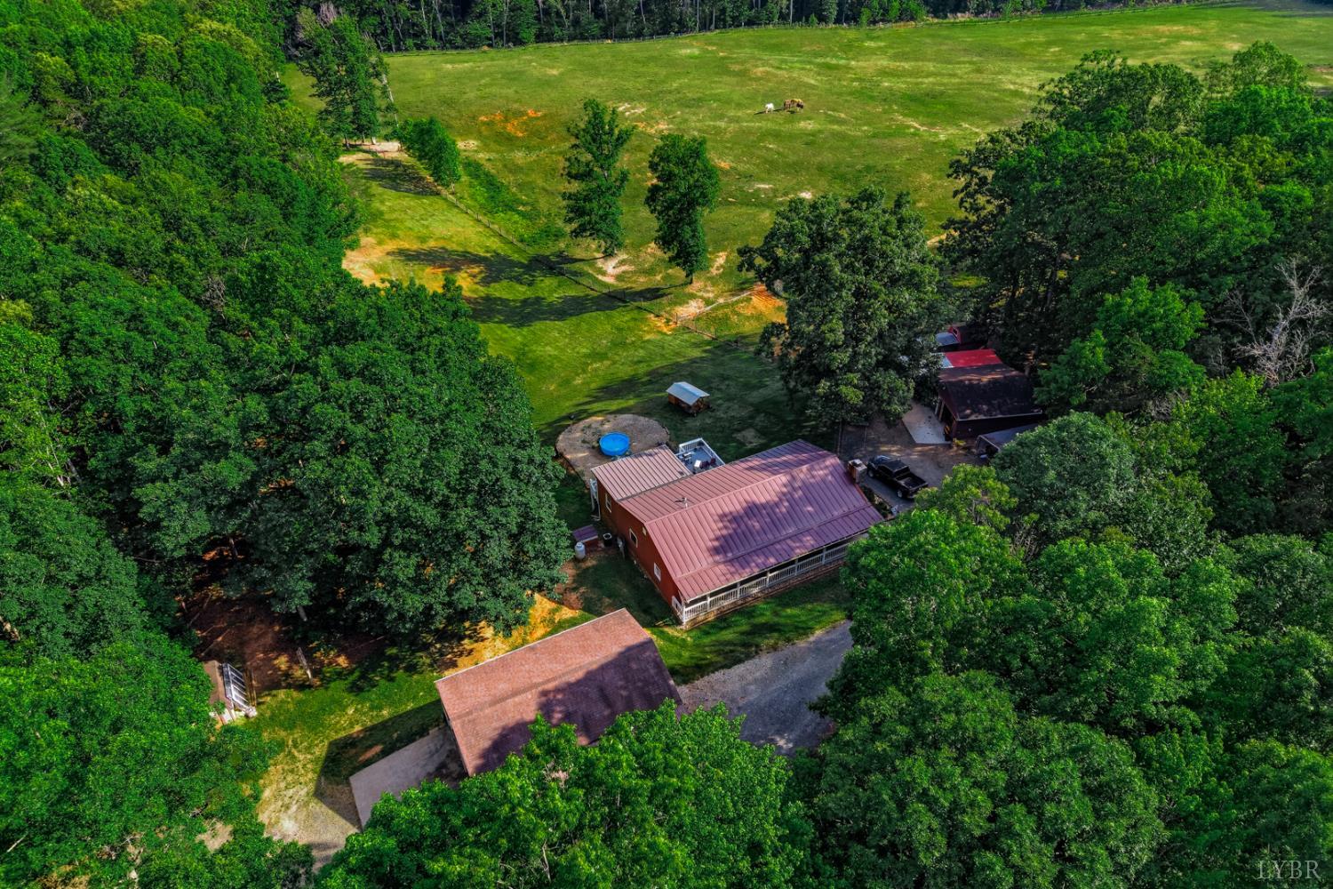 809 Plantation Road Amherst, VA 24521 - Photo 76 of 77 an aerial view of a house with a yard