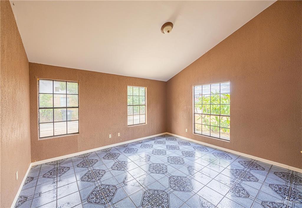 2415 East Expressway 83 Mission, TX 78572 - Photo 11 of 17 a view of an empty room with a window
