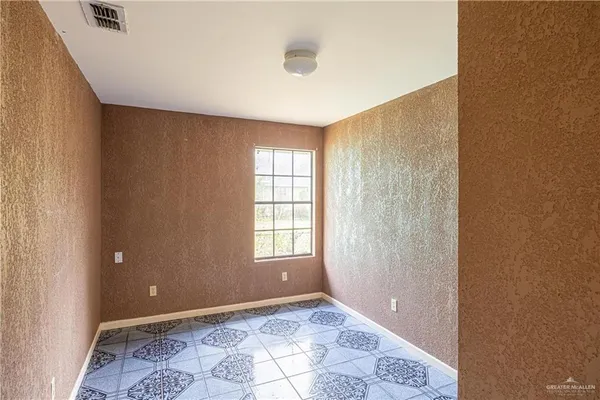 an empty room with a window