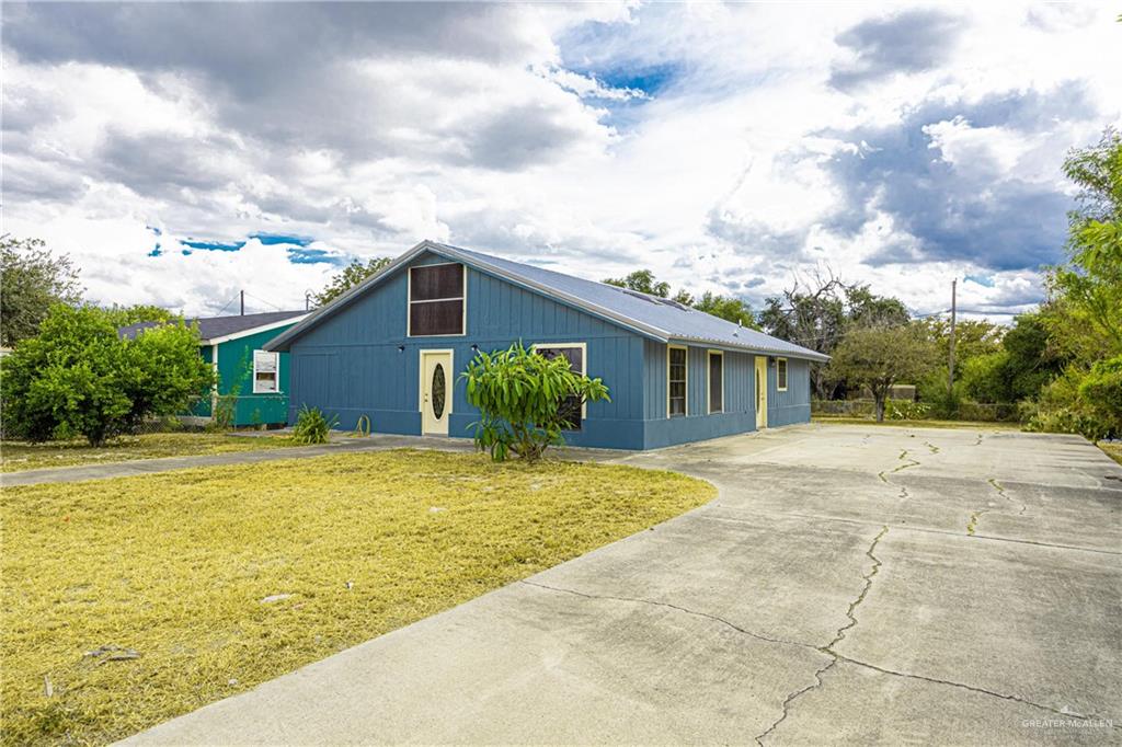 2415 East Expressway 83 Mission, TX 78572 - Photo 2 of 17 a view of a yard in front of the house