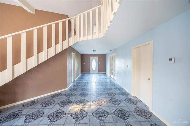 a view of a hallway with windows