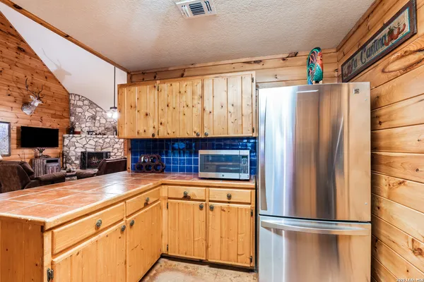 a view of a livingroom with furniture and window