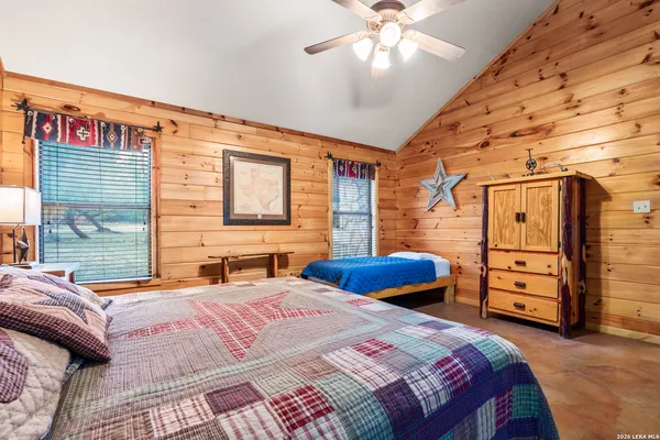 a bedroom with a bed and furniture