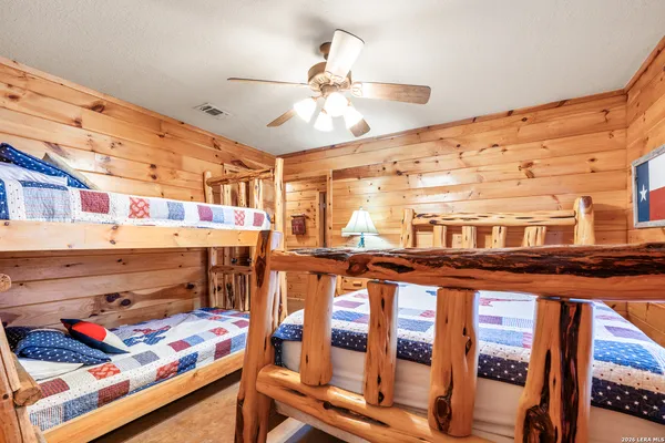 a bed room with a bed and a table