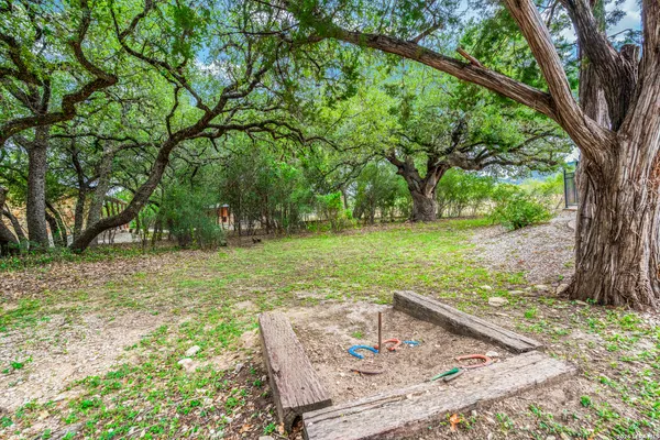 a view of a backyard with slide
