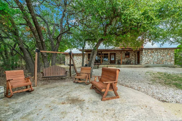 a view of a park with large trees