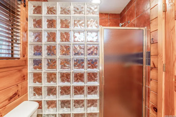 a view of a living room and a balcony