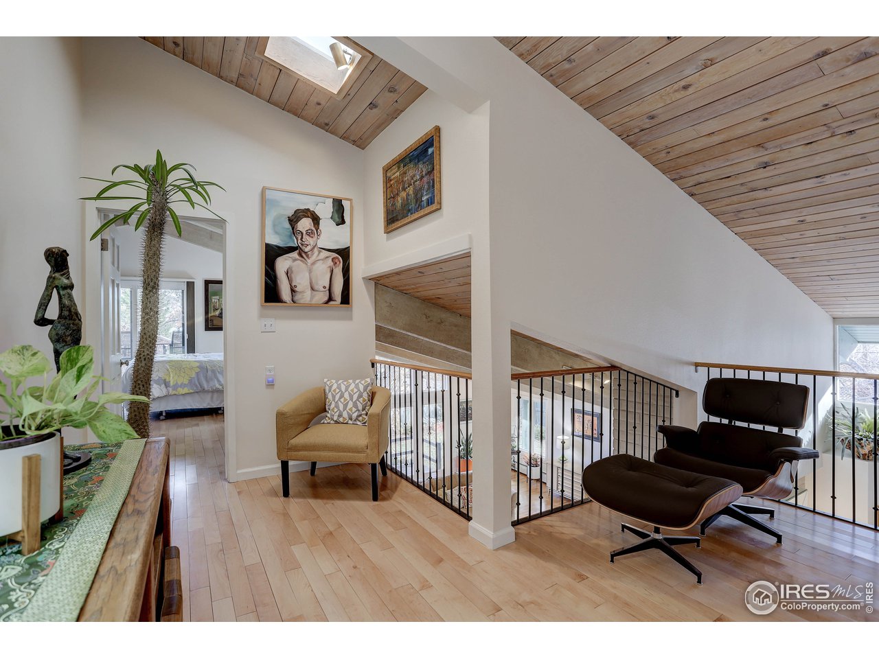 603 Kalmia Avenue Boulder, CO 80304 - Photo 18 of 39 a living room with furniture and wooden floor