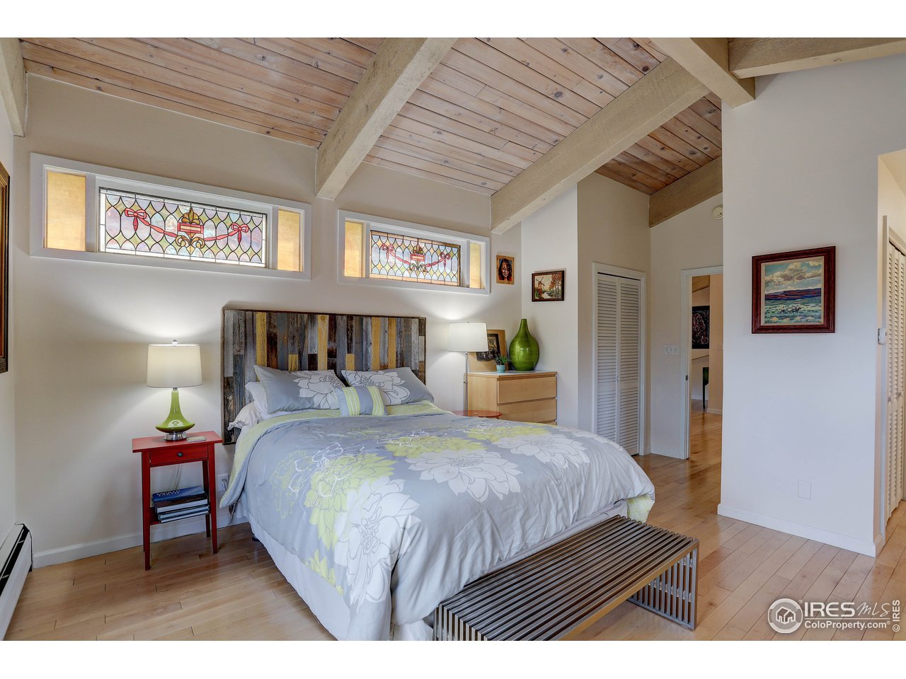 603 Kalmia Avenue Boulder, CO 80304 - Photo 21 of 39 a bedroom with a bed and a table