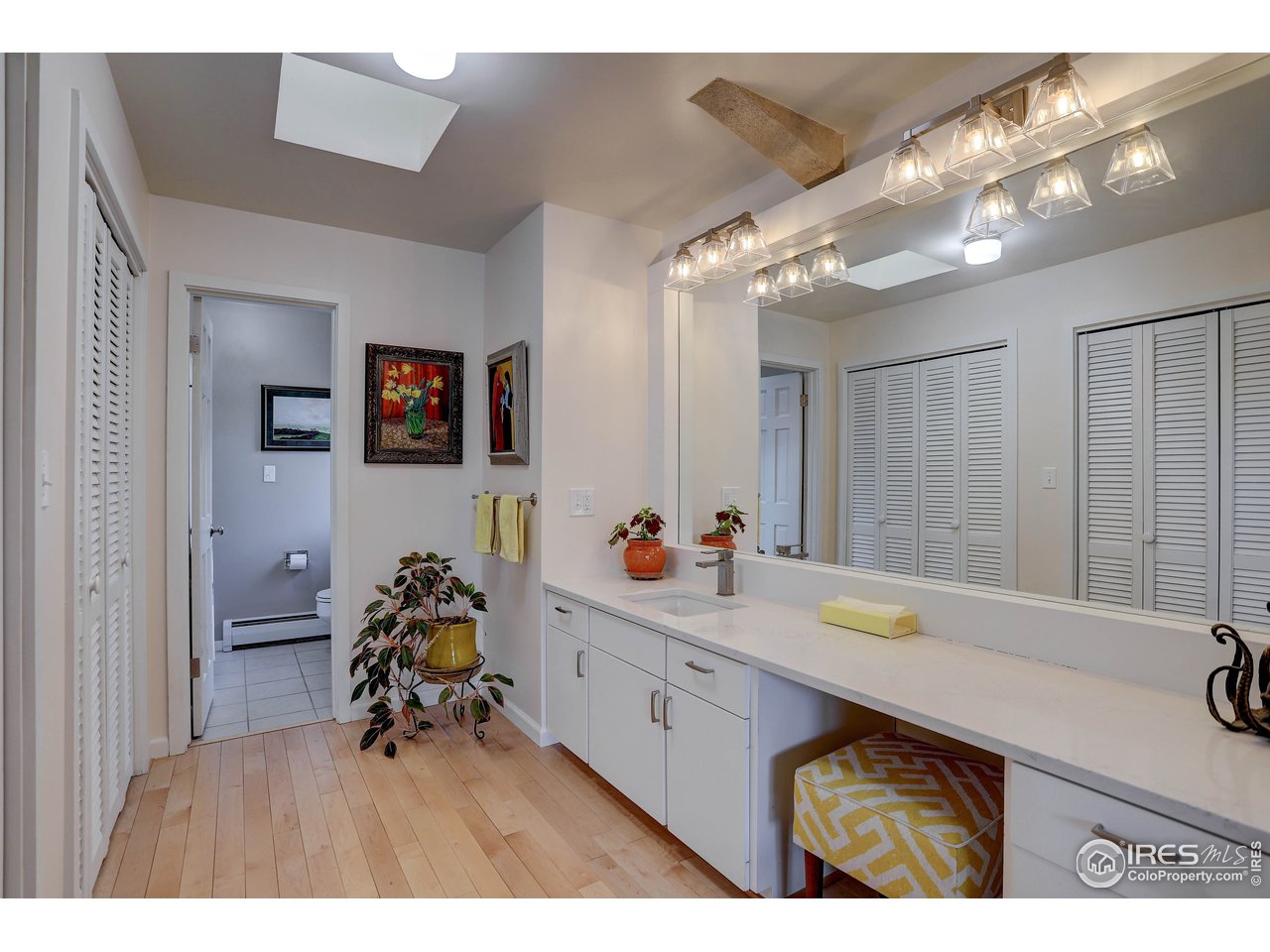 603 Kalmia Avenue Boulder, CO 80304 - Photo 22 of 39 a bathroom with a sink double vanity and a mirror