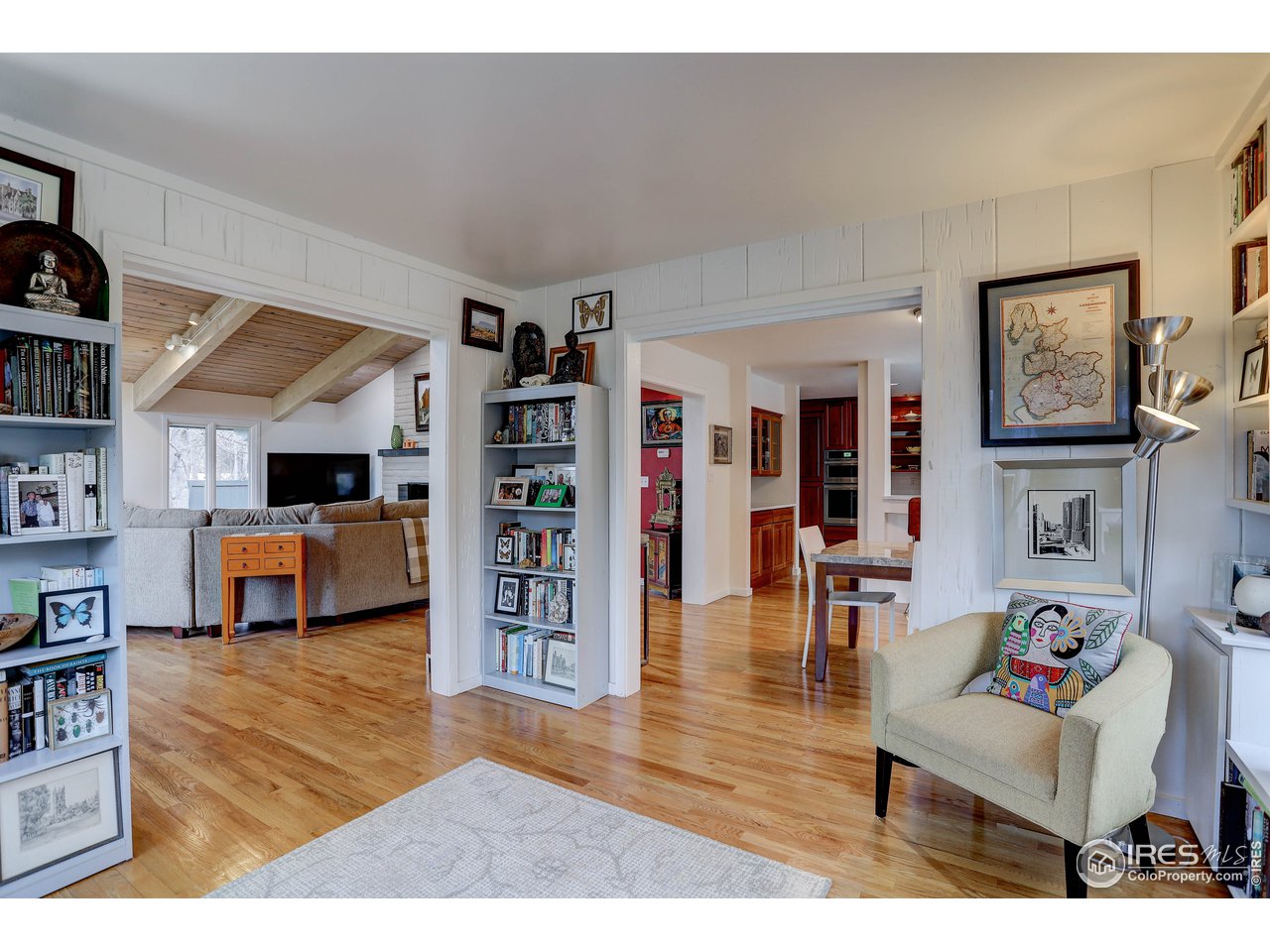 603 Kalmia Avenue Boulder, CO 80304 - Photo 28 of 39 a living room with furniture and a book shelf