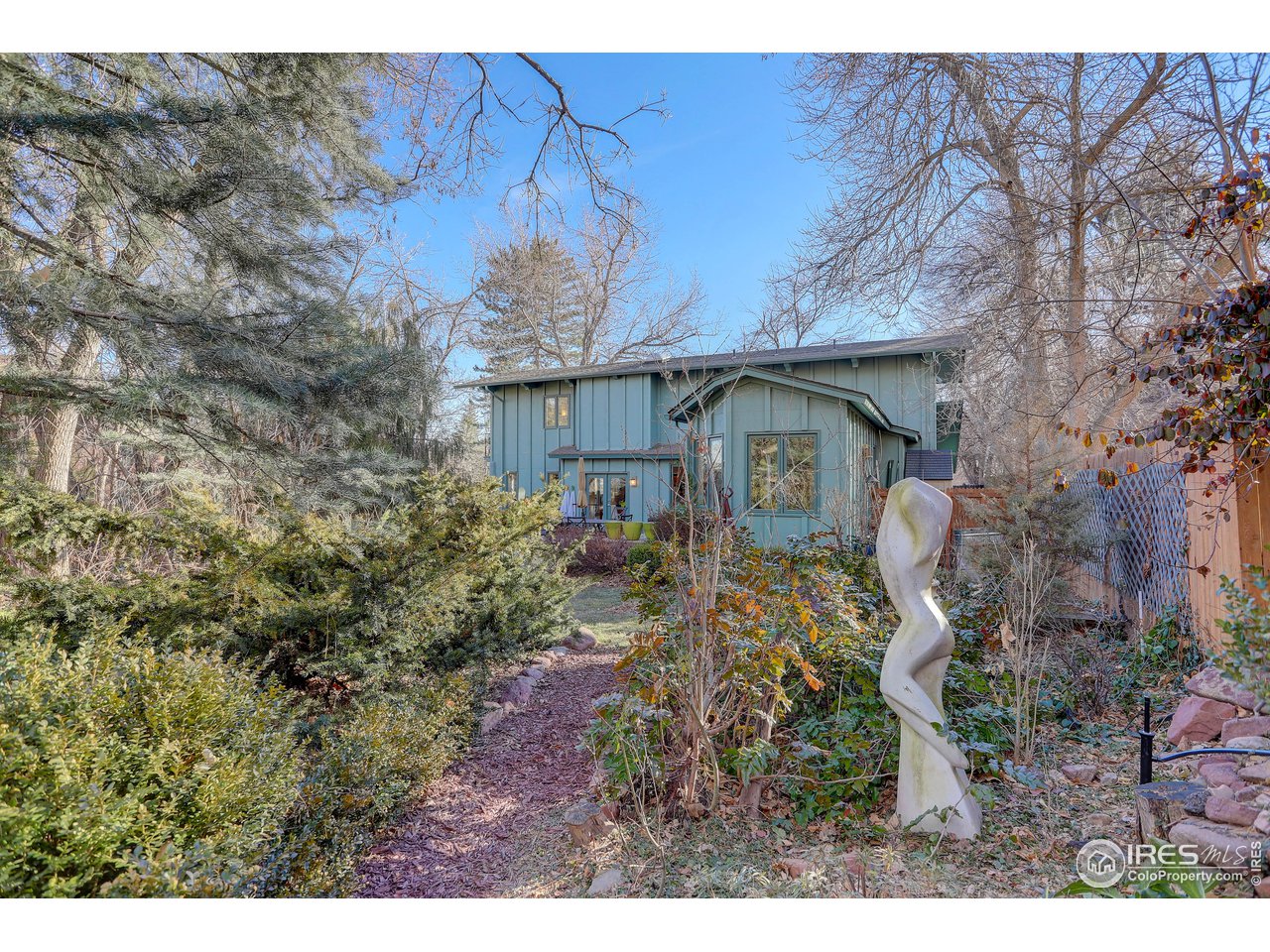 603 Kalmia Avenue Boulder, CO 80304 - Photo 35 of 39 a front view of a house with garden