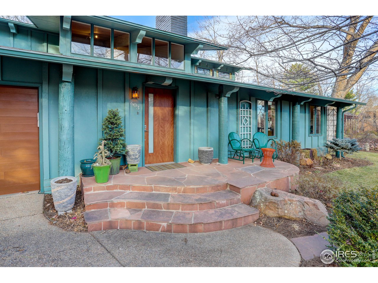 603 Kalmia Avenue Boulder, CO 80304 - Photo 37 of 39 a backyard of a house with seating space