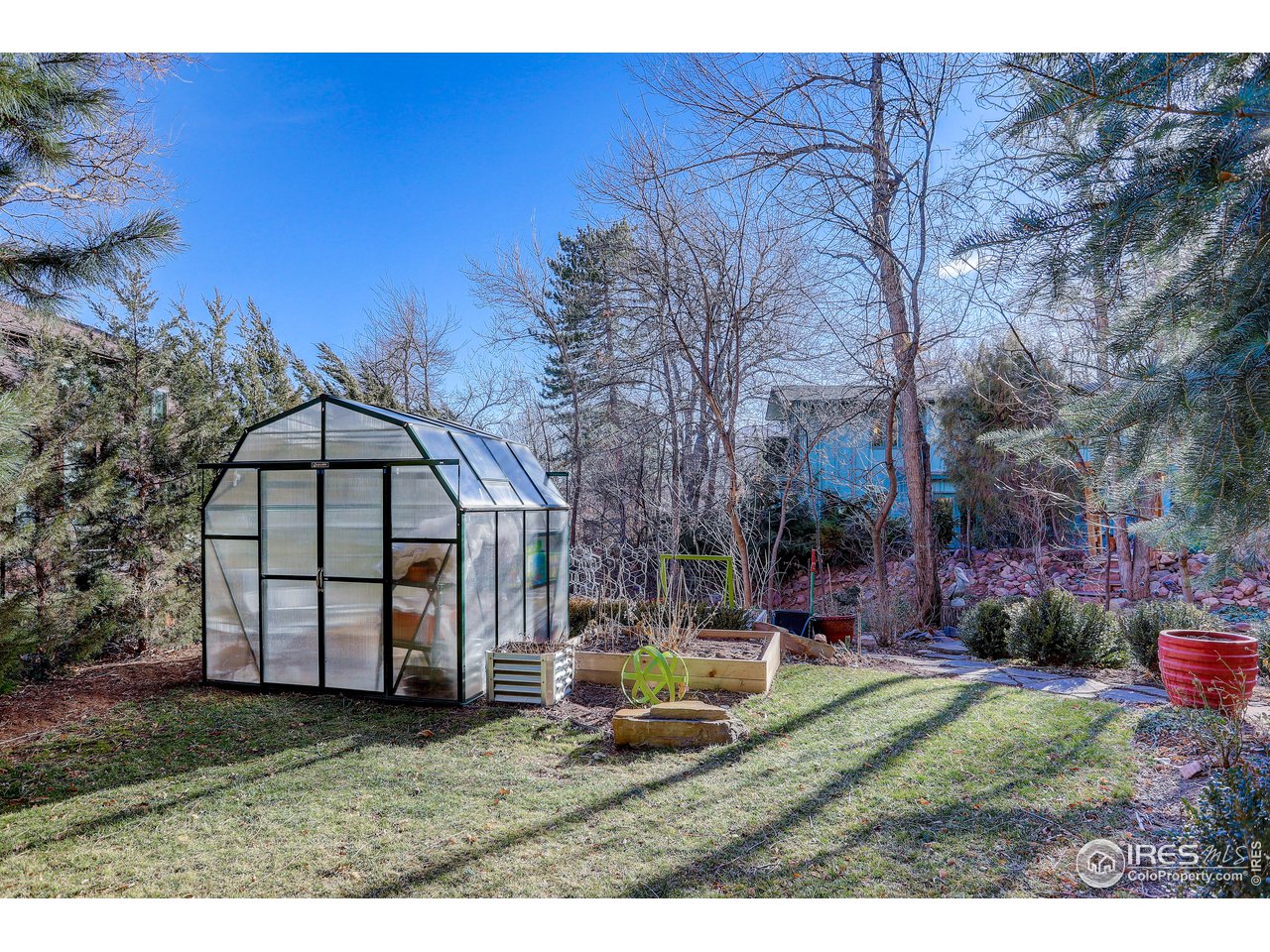 603 Kalmia Avenue Boulder, CO 80304 - Photo 38 of 39 a view of a backyard with potted plants and large trees