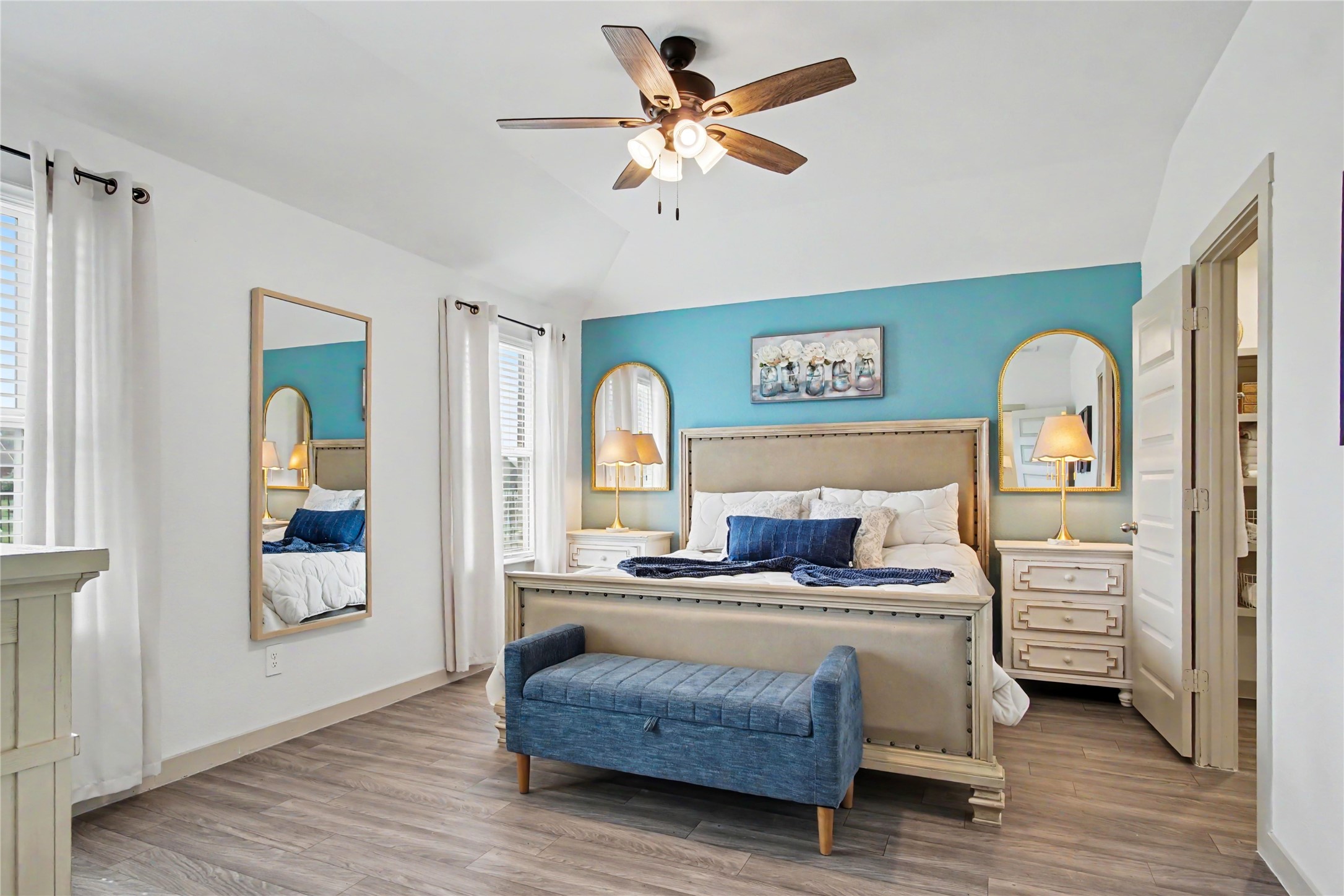 1302 Truckee River Drive Rosharon, TX 77583 - Photo 23 of 39 The spacious primary bedroom is at the back of the home. The windows look out to the backyard.