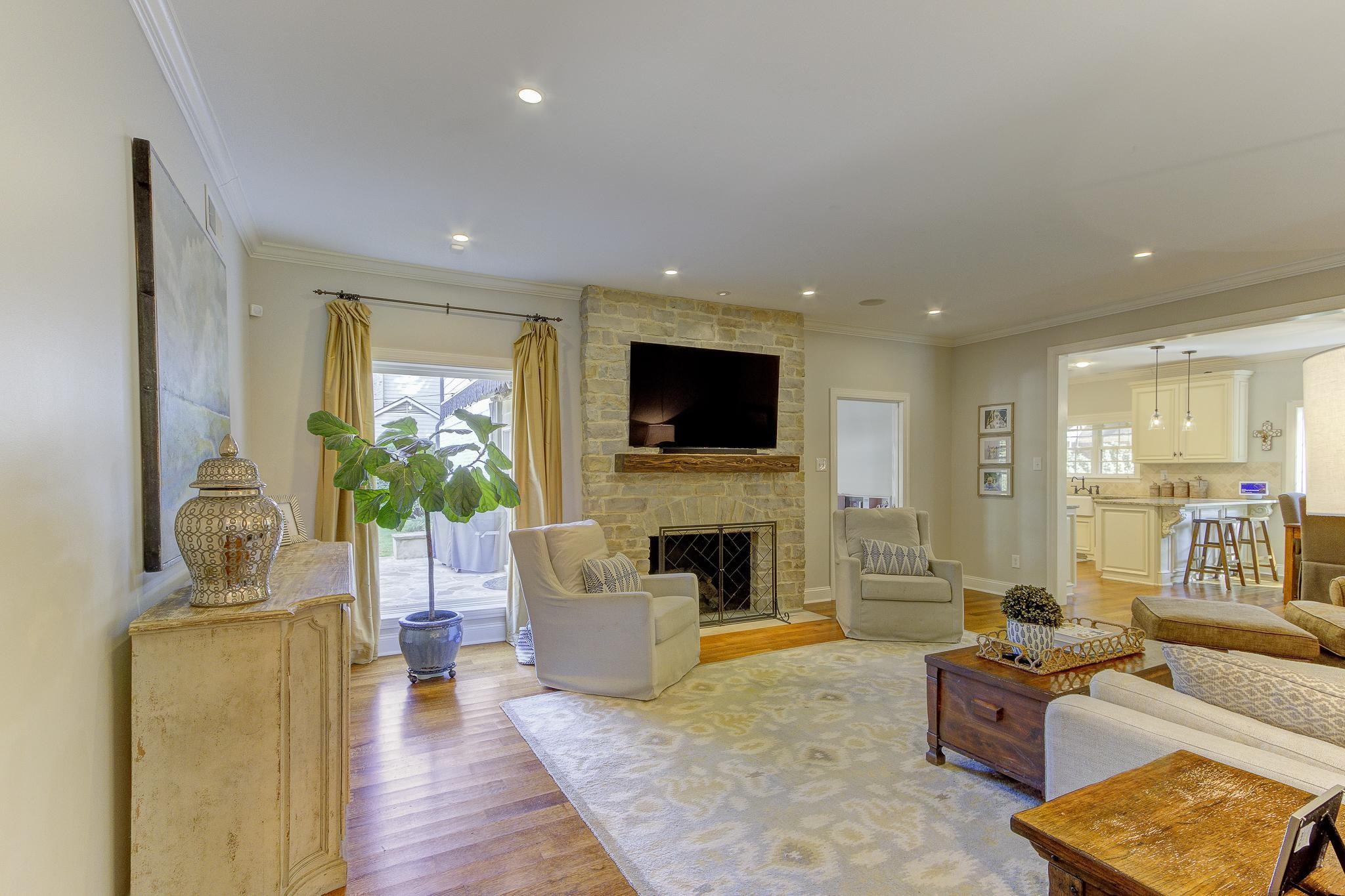 4414 Walnut Grove Road Memphis, TN 38117 - Photo 18 of 40 a living room with furniture fireplace and flat screen tv