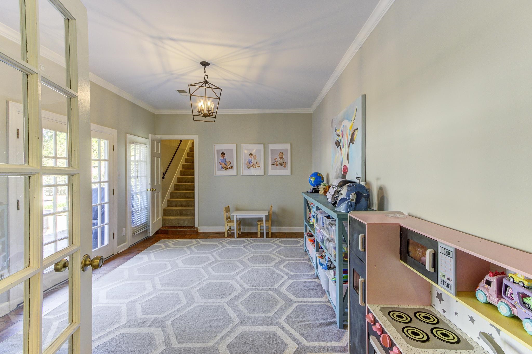 4414 Walnut Grove Road Memphis, TN 38117 - Photo 28 of 40 a view of a livingroom with furniture and a window