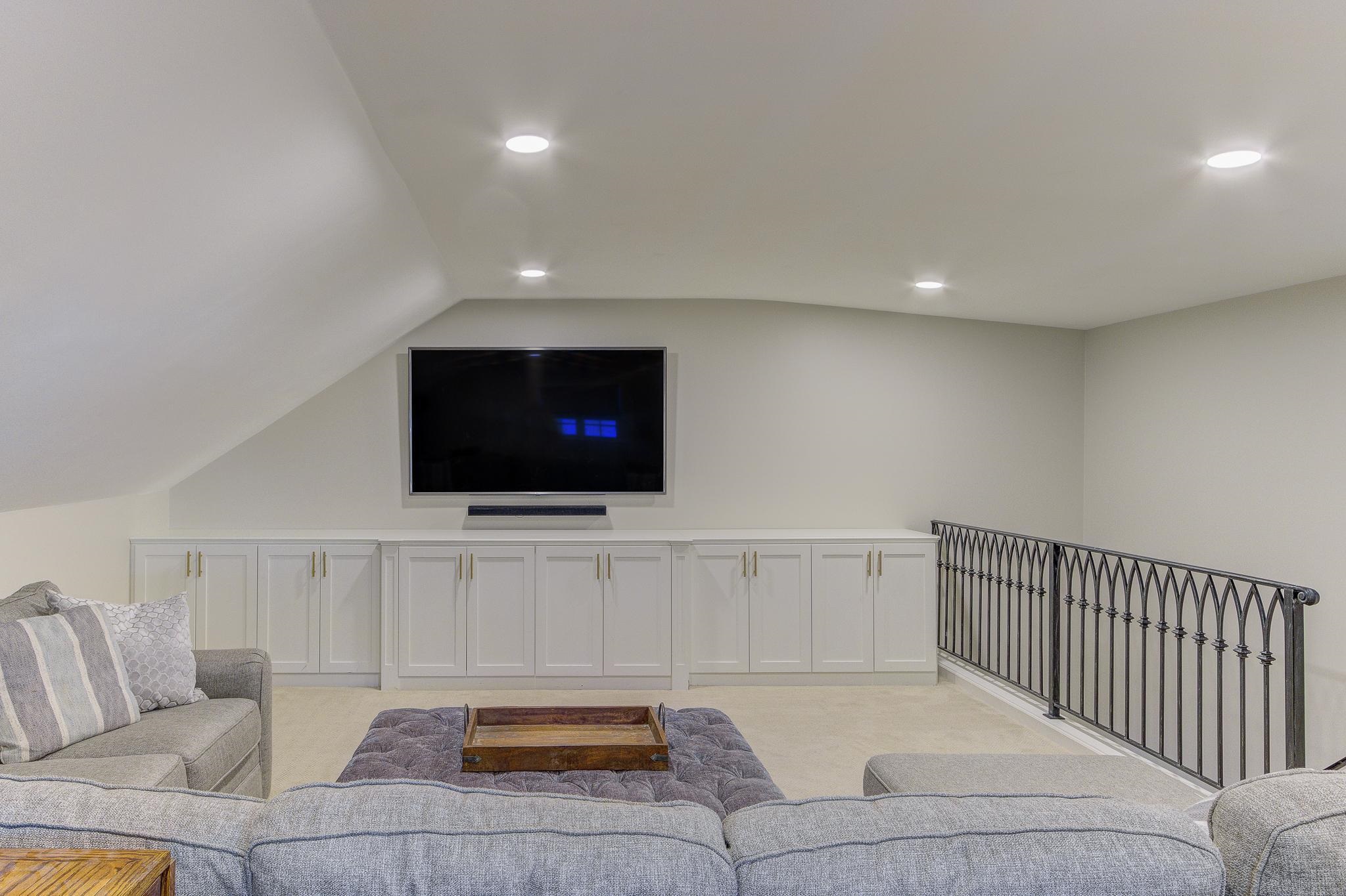 4414 Walnut Grove Road Memphis, TN 38117 - Photo 29 of 40 a living room with furniture and a flat screen tv