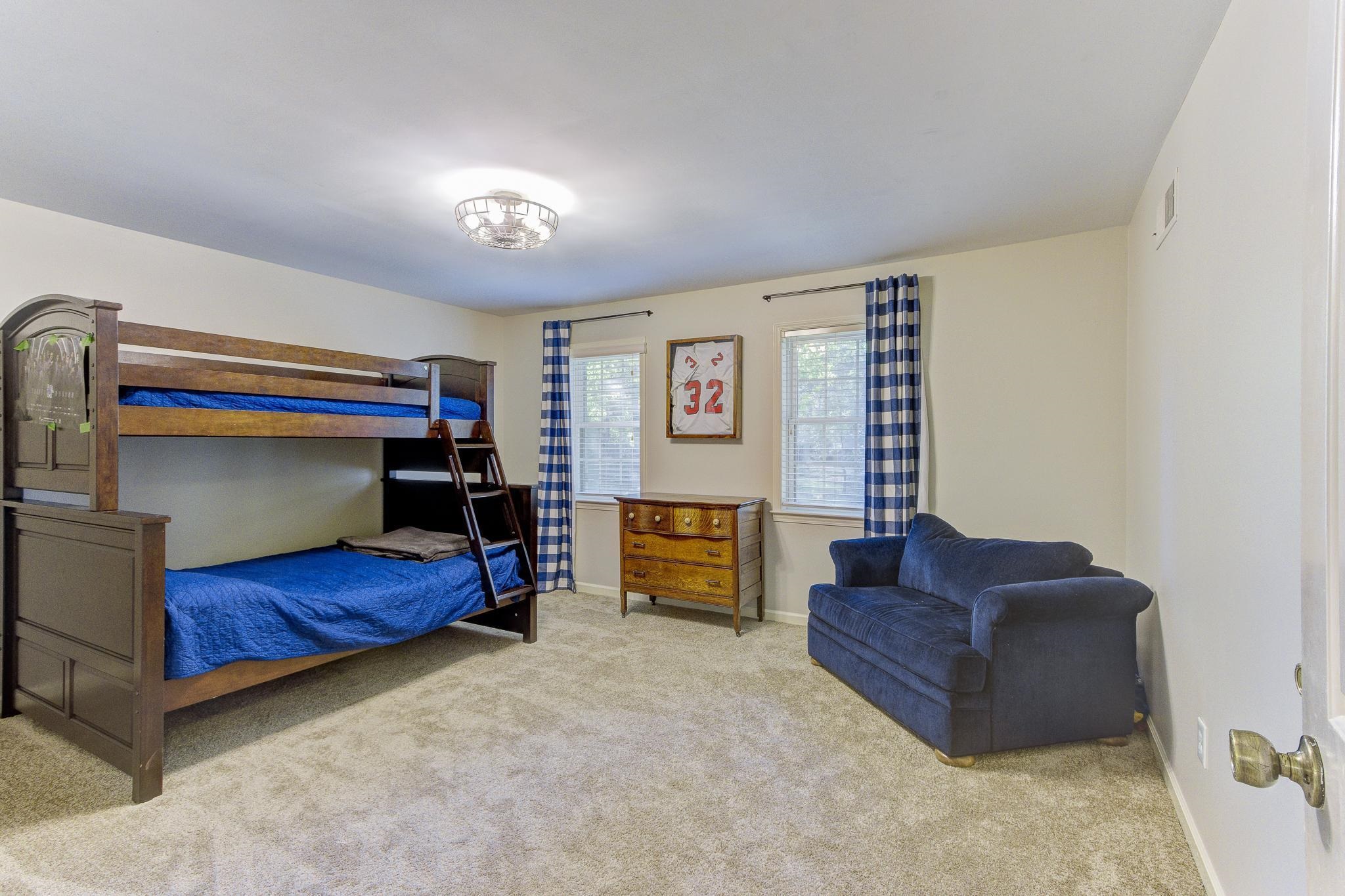 4414 Walnut Grove Road Memphis, TN 38117 - Photo 31 of 40 a bedroom with furniture and a bathtub