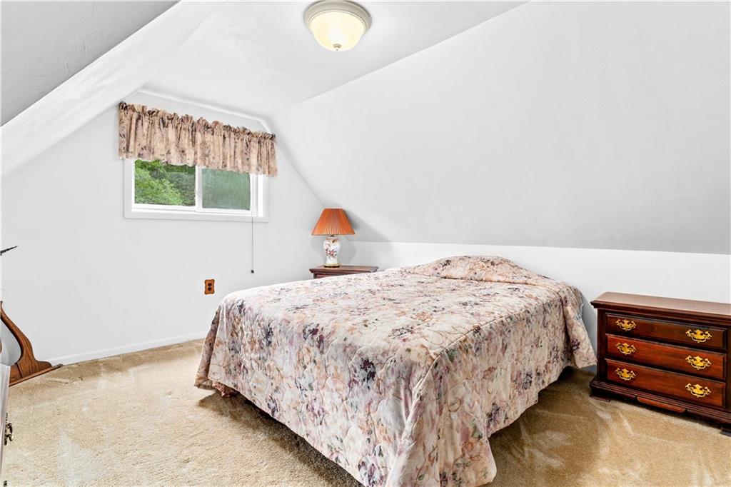 645 New Geneva Road Point Marion, PA 15474 - Photo 20 of 36 a bedroom with a bed and a window