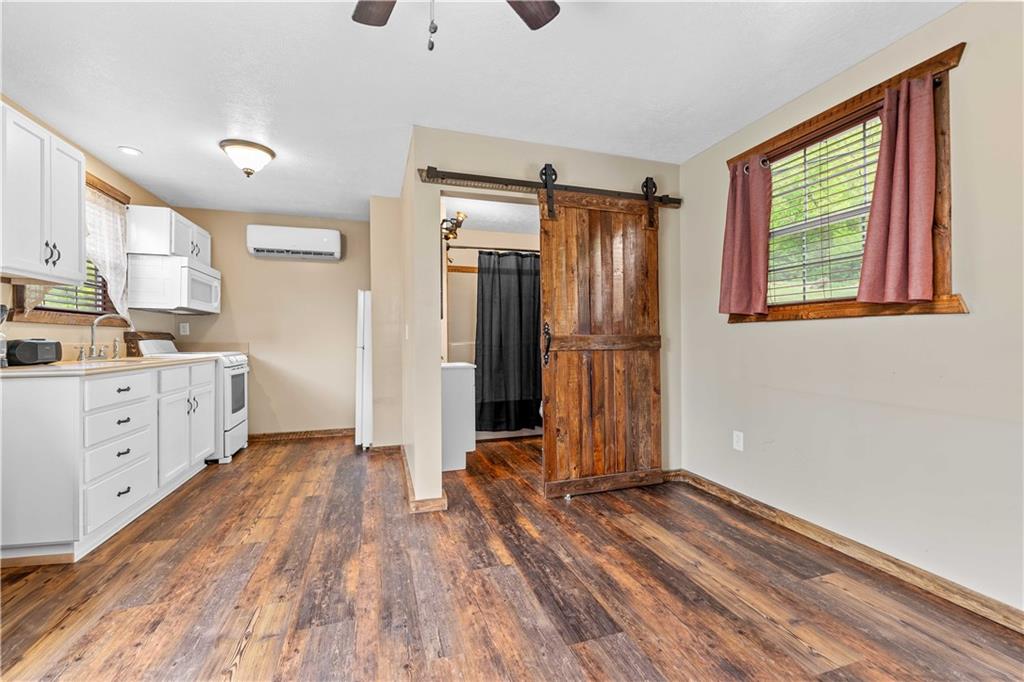 645 New Geneva Road Point Marion, PA 15474 - Photo 26 of 36 a view of a kitchen with electric appliances