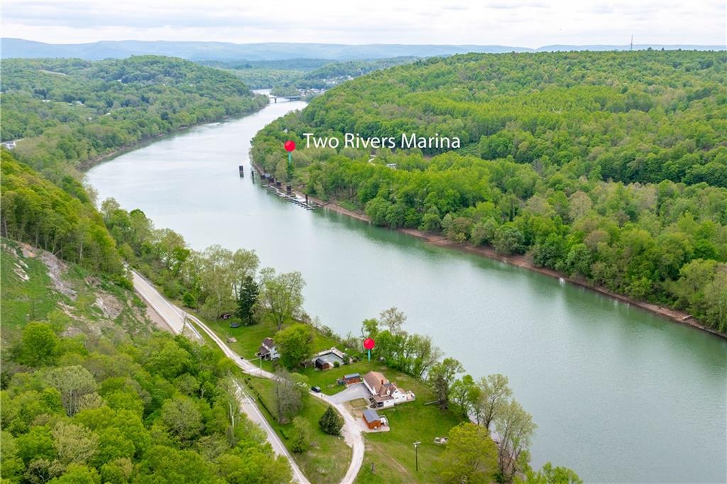 645 New Geneva Road Point Marion, PA 15474 - Photo 34 of 36 a view of a lake with a park