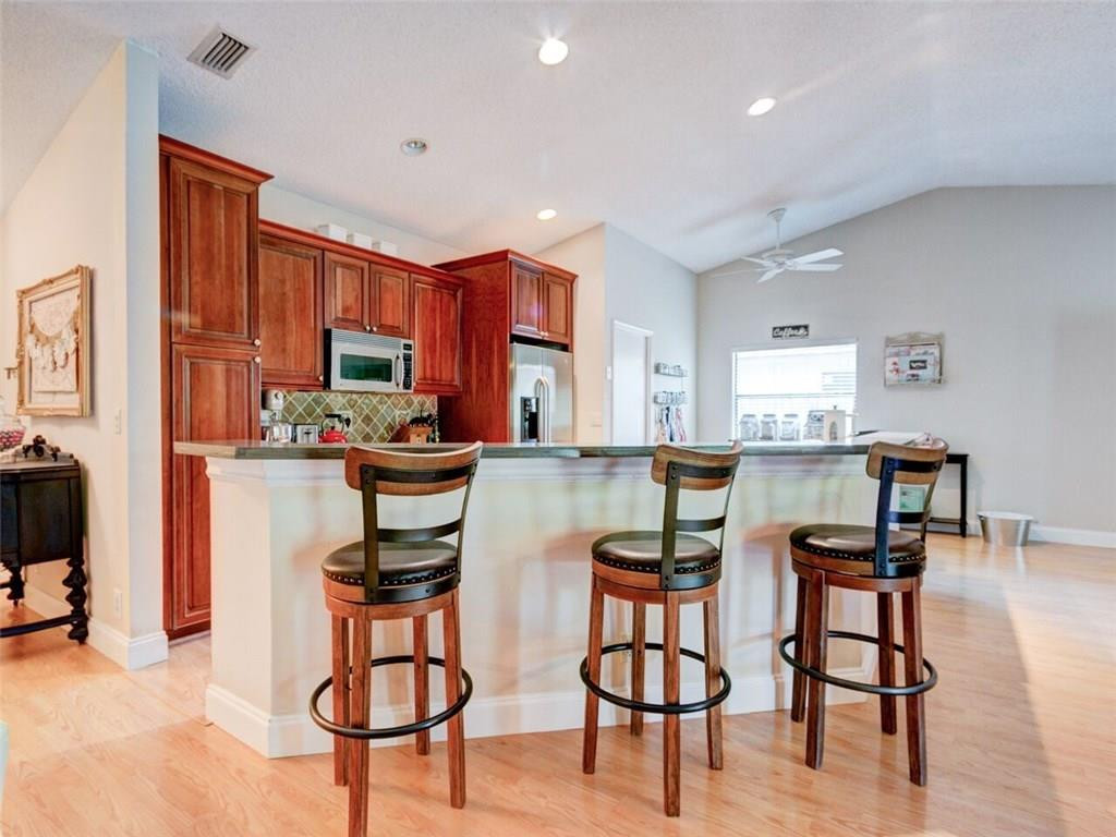 7517 Texas Trail Boca Raton, FL 33487 - Photo 3 of 32 Open kitchen with counter seating