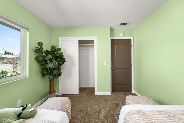 a view of a hallway with windows