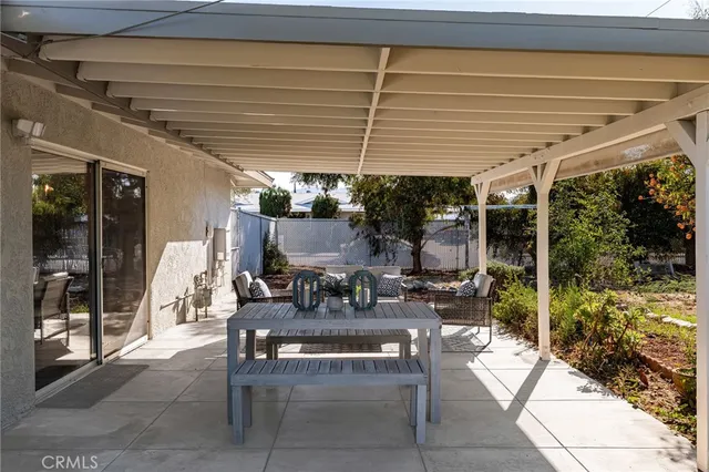 a view of a terrace with a garden